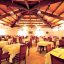 L'ampia sala climatizzata del Ristorante all'Eurovillage, Villaggio 3 stelle in Sardegna