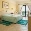 Le camere del Villaggio Marina Garden & Beach in Sardegna sono eleganti e confortevoli