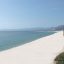 Vista della spiaggia di sabbia bianca dell'Hotel Club Marina Beach di Orosei.