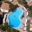 Panoramica della piscina attrezzata del Palmasera Village Resort
